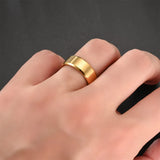 Brushed steel 8mm band ring worn on a hand