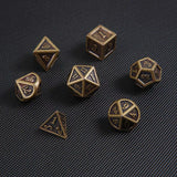 Metal polyhedral dice set in antique bronze